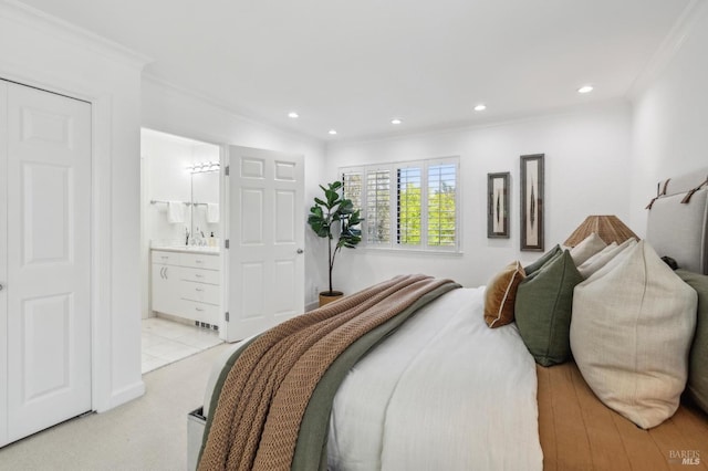 bedroom featuring crown molding, recessed lighting, connected bathroom, and light colored carpet