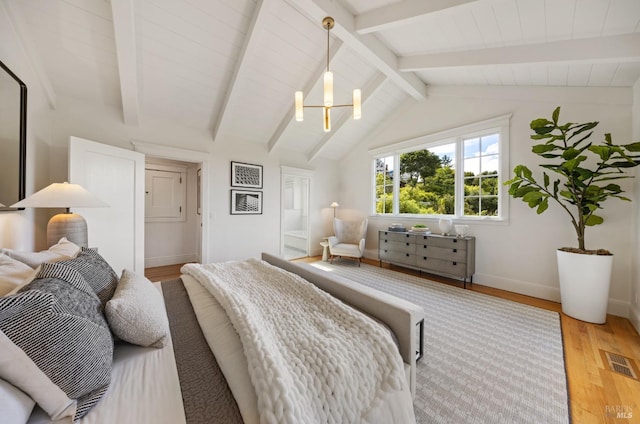 bedroom with visible vents, baseboards, lofted ceiling with beams, a notable chandelier, and light wood-style flooring