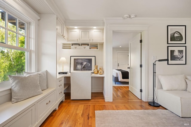 interior space with recessed lighting, ornamental molding, and light wood finished floors