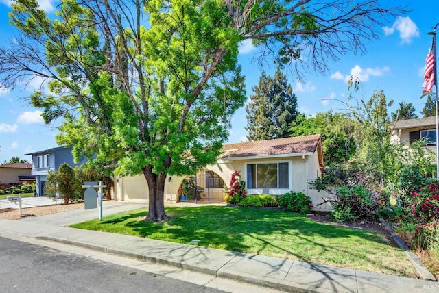 3432 Norwalk Pl, Fairfield, CA 94534 - view of front of property with stucco siding, concrete driveway, a front lawn, a garage, and a tile roof