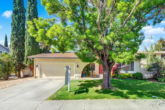 3432 Norwalk Pl, Fairfield, CA 94534 - view of front of home with concrete driveway, an attached garage, stucco siding, a front yard, and a tiled roof