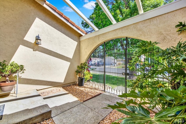3432 Norwalk Pl, Fairfield, CA 94534 - view of exterior entry with stucco siding and fence