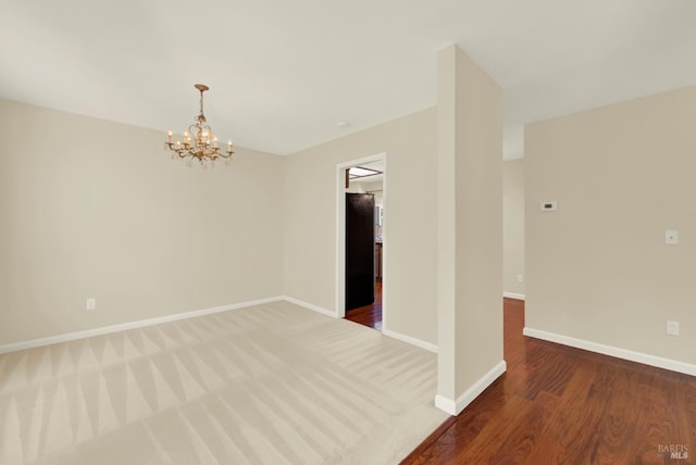 3432 Norwalk Pl, Fairfield, CA 94534 - unfurnished room with a chandelier, baseboards, and wood finished floors