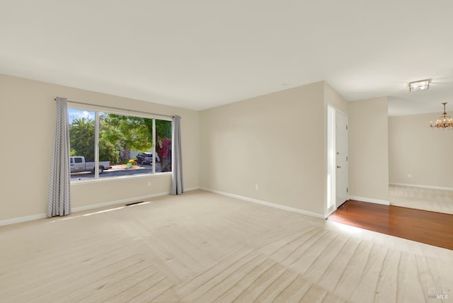 3432 Norwalk Pl, Fairfield, CA 94534 - carpeted spare room with a chandelier and baseboards