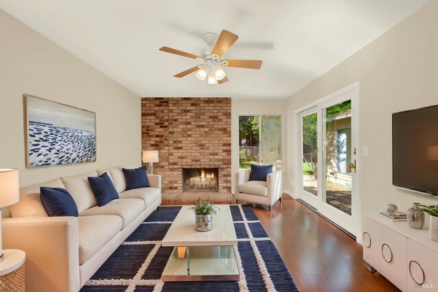 3432 Norwalk Pl, Fairfield, CA 94534 - living area featuring wood finished floors, a ceiling fan, and a fireplace
