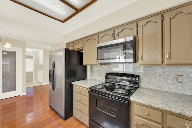 3432 Norwalk Pl, Fairfield, CA 94534 - kitchen with stainless steel appliances, backsplash, light wood finished floors, and baseboards