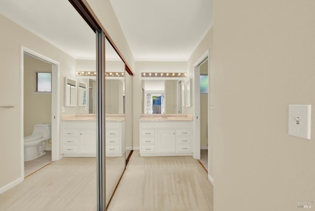 3432 Norwalk Pl, Fairfield, CA 94534 - full bath with toilet, vanity, crown molding, and baseboards