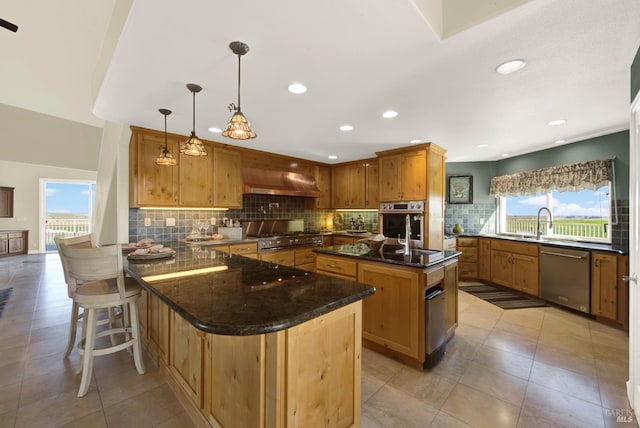 kitchen with a peninsula, light tile patterned flooring, recessed lighting, appliances with stainless steel finishes, and backsplash