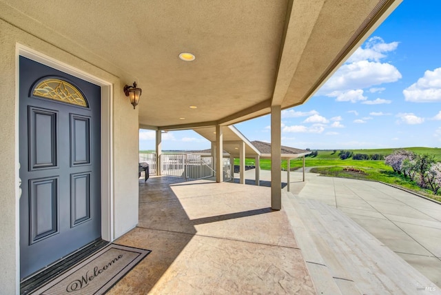 view of patio with fence
