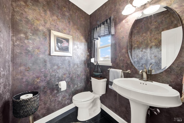 8560 Holmes Ln, Winters, CA 95694 - half bathroom with baseboards, toilet, and tile patterned flooring