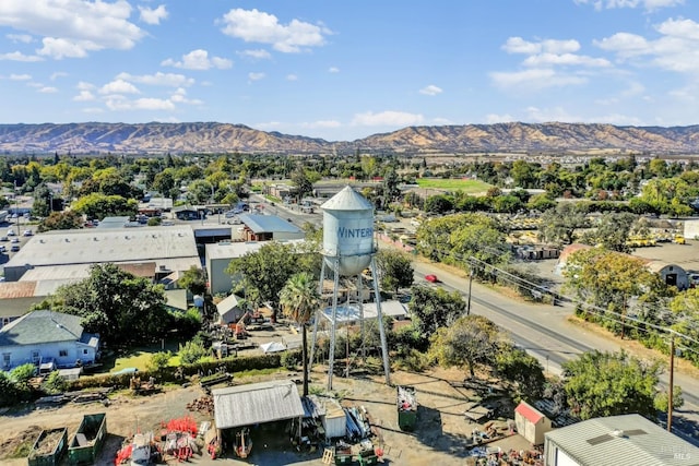 drone / aerial view featuring a mountain view