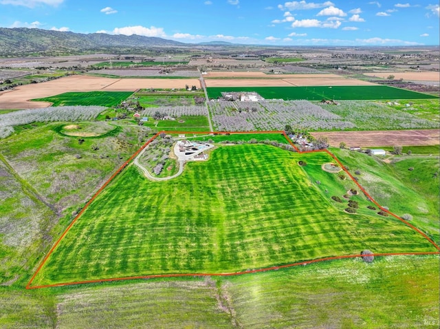 bird's eye view with a mountain view and a rural view