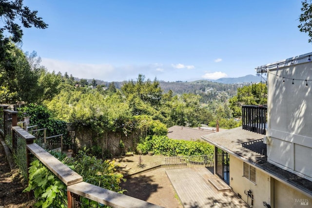 mountain view featuring a view of trees