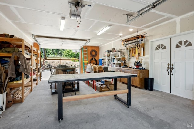 garage with a workshop area