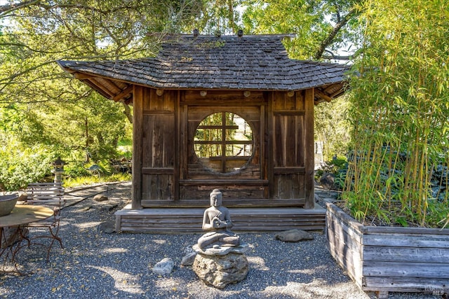 view of outbuilding featuring an outdoor structure