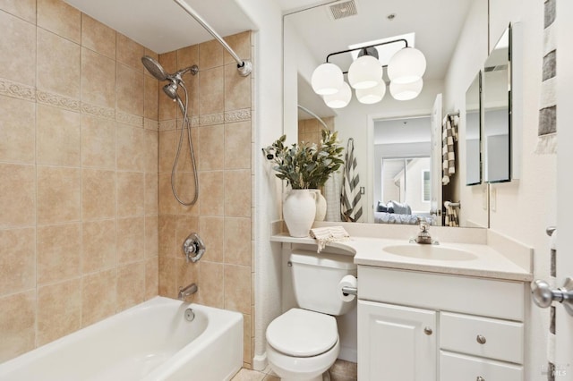 bathroom featuring shower / bath combination, vanity, toilet, and visible vents