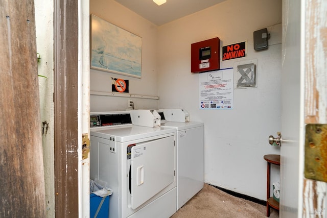 community laundry room featuring washer and dryer