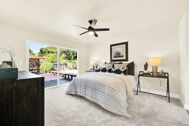 bedroom with light carpet, baseboards, access to exterior, and ceiling fan