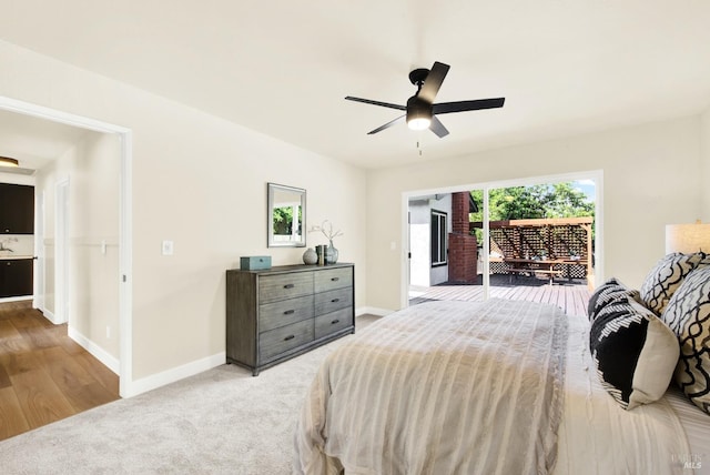 bedroom featuring carpet flooring, baseboards, access to exterior, and ceiling fan