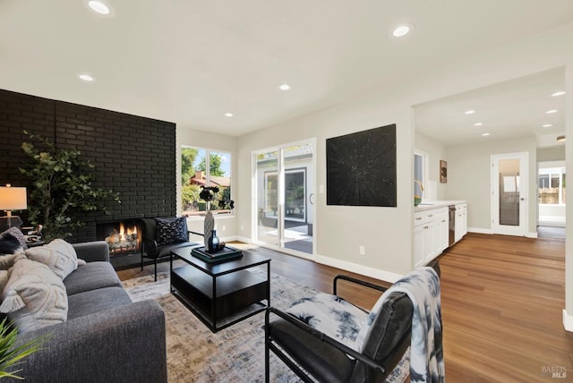 1426 Shelby Dr, Fairfield, CA 94534 - living room with light wood finished floors, baseboards, recessed lighting, and a fireplace