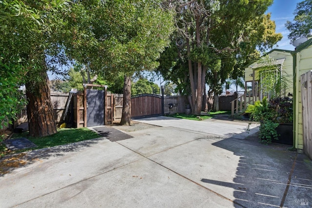 view of gate with fence
