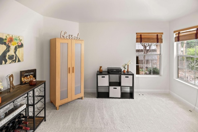 office area with baseboards and carpet