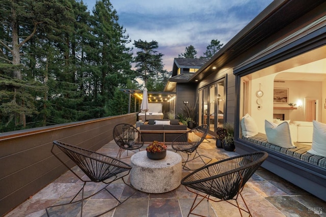 view of patio / terrace featuring french doors and an outdoor hangout area