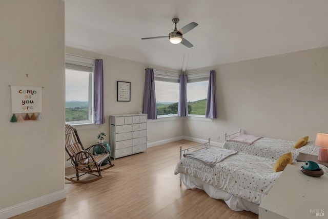 6200 Burnside Rd, Sebastopol, CA 95472 - bedroom featuring wood finished floors, baseboards, and a ceiling fan