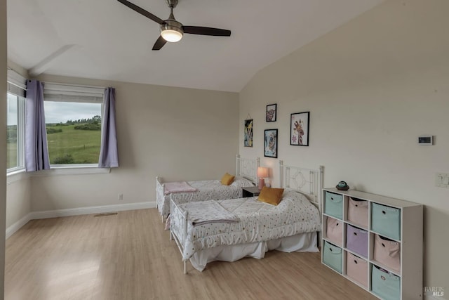 6200 Burnside Rd, Sebastopol, CA 95472 - bedroom with vaulted ceiling, light wood-type flooring, baseboards, and a ceiling fan