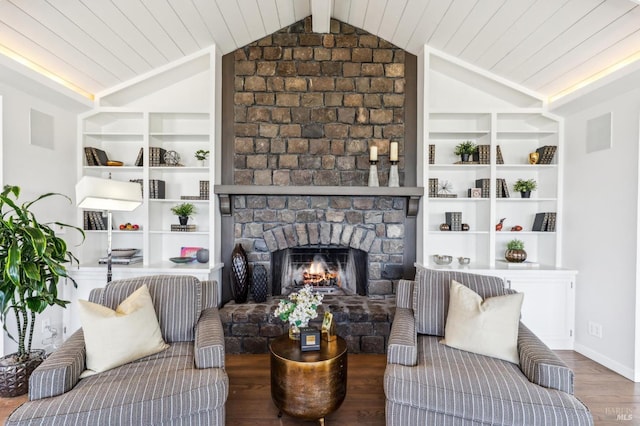 living area with a fireplace, wood ceiling, vaulted ceiling with beams, and wood finished floors