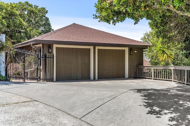 garage featuring fence