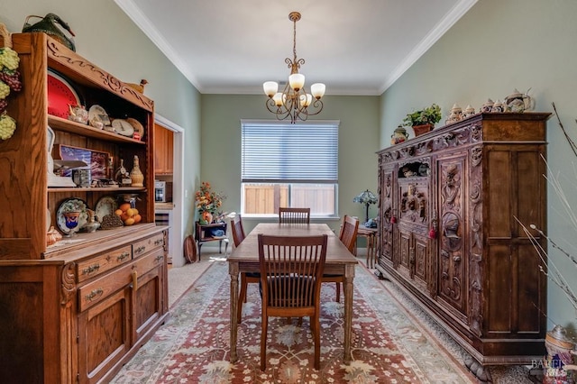 dining area with crown molding and a notable chandelier