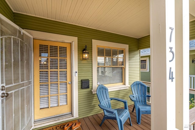 deck with covered porch