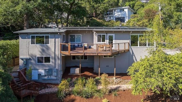 5 Oak Springs Dr, San Anselmo, CA 94960 - rear view of house with a wooden deck and stucco siding