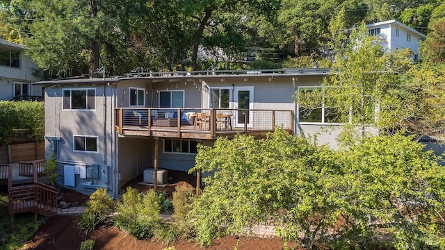 5 Oak Springs Dr, San Anselmo, CA 94960 - rear view of house with central AC unit, stucco siding, and a deck