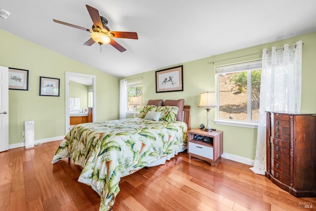 1300 Steele Canyon Rd, Napa, CA 94558 - bedroom featuring wood finished floors, lofted ceiling, baseboards, ceiling fan, and connected bathroom