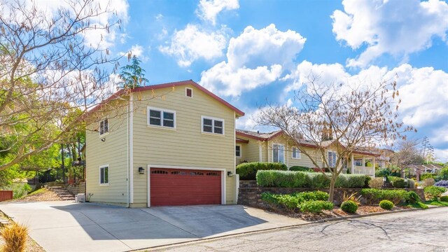 1300 Steele Canyon Rd, Napa, CA 94558 - view of front of house with an attached garage and driveway