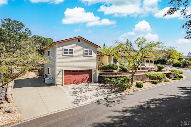 1300 Steele Canyon Rd, Napa, CA 94558 - view of front facade featuring a garage and concrete driveway