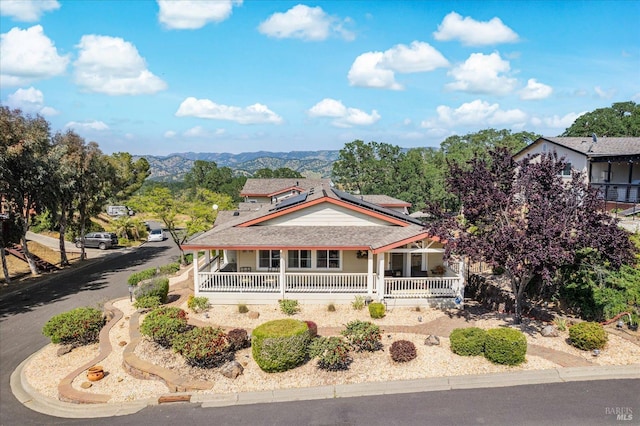 1300 Steele Canyon Rd, Napa, CA 94558 - view of front facade with a porch, solar panels, and a mountain view