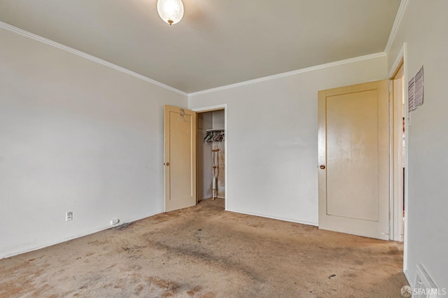 unfurnished bedroom featuring crown molding, visible vents, and carpet floors