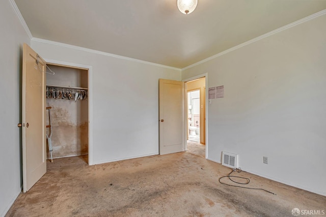 unfurnished bedroom featuring carpet floors, ornamental molding, a closet, and visible vents
