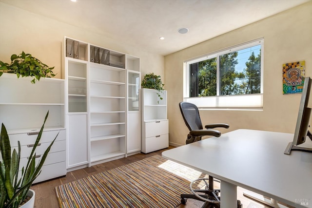 home office with recessed lighting and wood finished floors