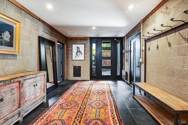 mudroom with concrete floors