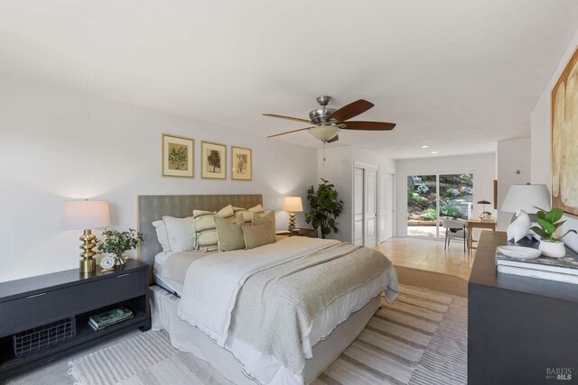 bedroom with a ceiling fan and visible vents