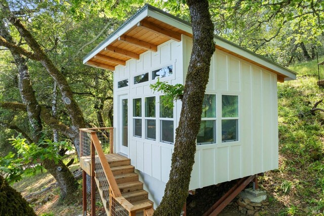 view of home's exterior with board and batten siding