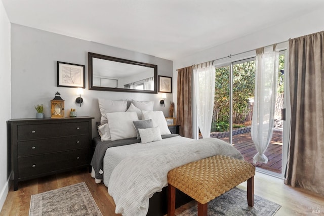 28 Washington St, Novato, CA 94947 - bedroom with access to exterior and wood finished floors