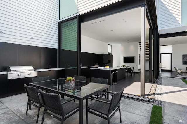 dining area featuring finished concrete floors