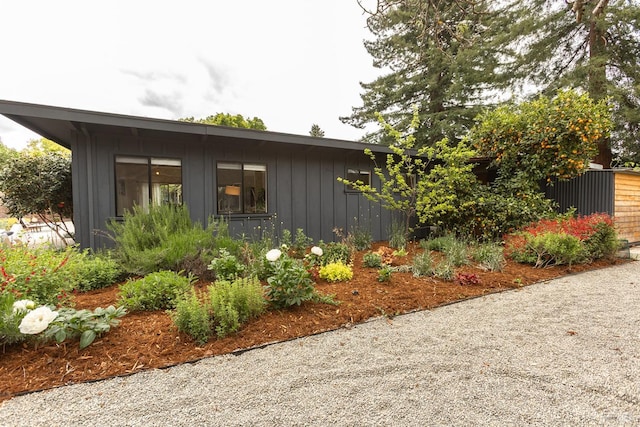 view of side of property featuring board and batten siding