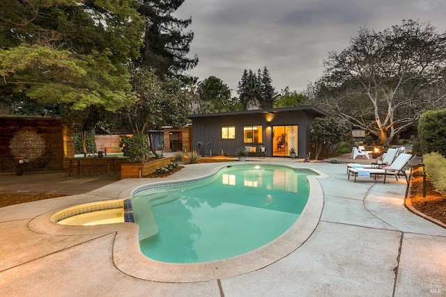 outdoor pool featuring a patio area