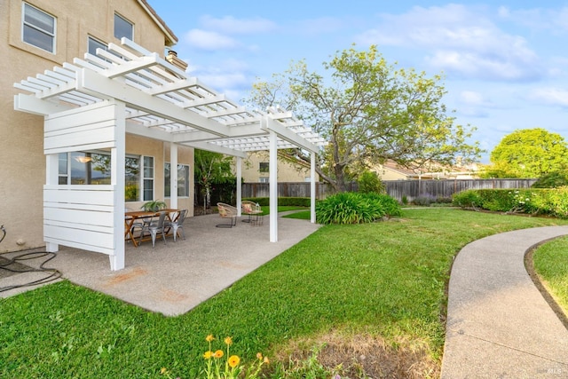 view of yard featuring a patio, a pergola, and a fenced backyard